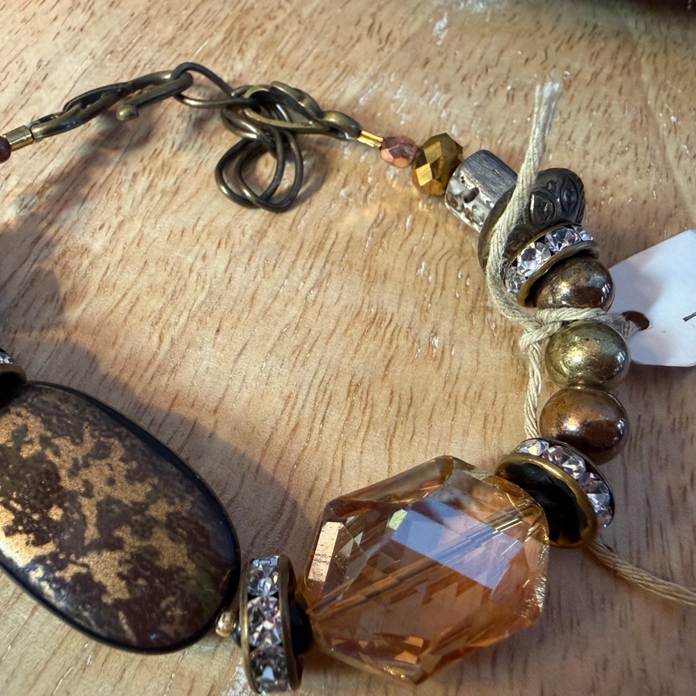 Elegant Gold and Brown Bracelet